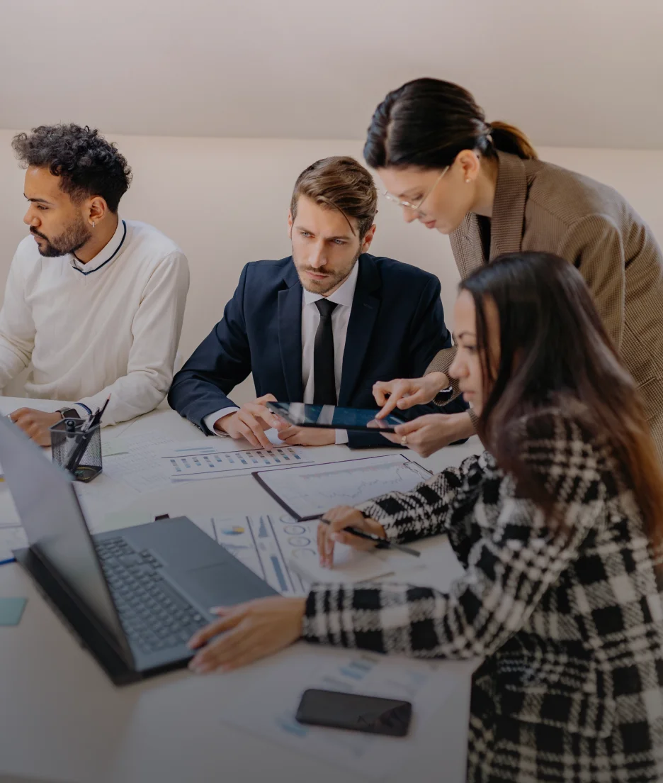 Team meeting around a table in an office
